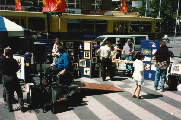 People moving around stalls on burke street