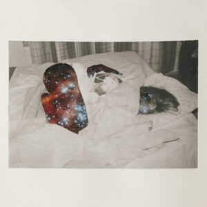 A photo of a figure lying on bed. The skin has been replaced by a galaxy.